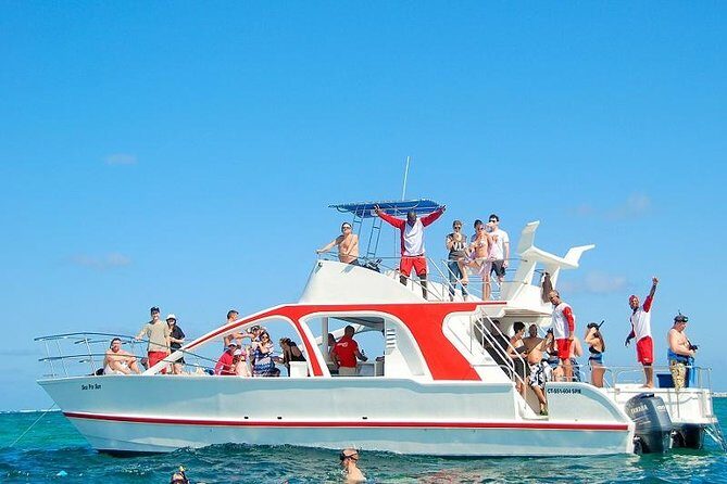 Adventure Combo: Party Boat Cruise & Parasailing - Snorkeling for 30 Minutes: Coral Reefs and Tropical Fish (Gear Included)
