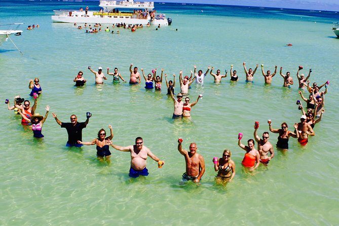 Adventure Combo: Party Boat Cruise & Parasailing - Photos and Extras: What to Budget for After You Land