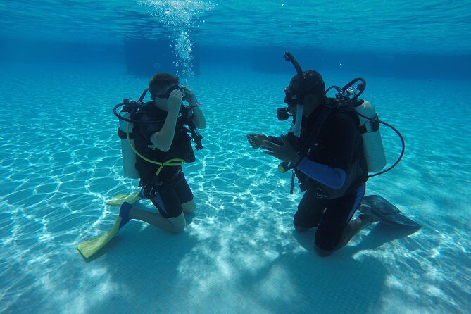 First Time Scuba Diving Experience in Punta Cana - Equipment rental, bottled water, and how to dress for comfort