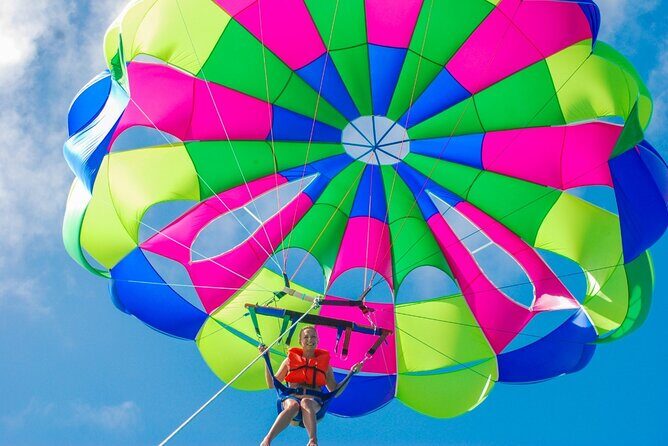 Parasailing in Punta Cana with Stunning Ocean Views - That Splash Moment: The Dip If Your Crew Allows It