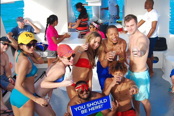 Private Party Boat with Slide and chicken skewers at Punta Cana - Cabo Engaño snorkeling stop with the water slide