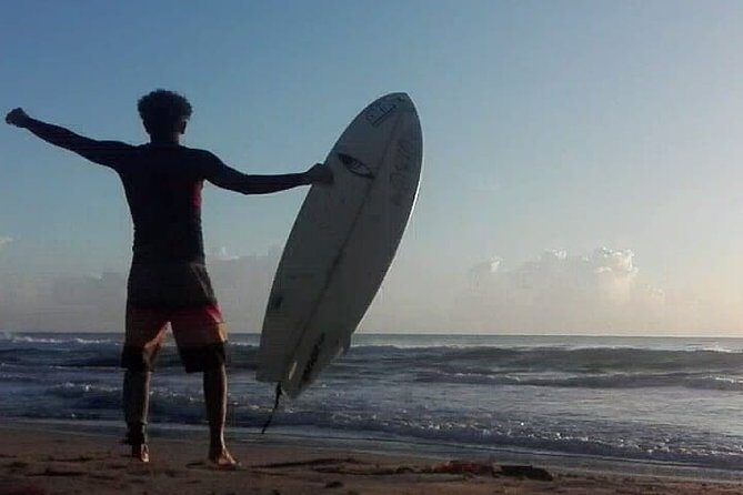Professional surf lessons Dominican Republic, Cabarete, Encuentro - The beach intro: warmup stretch, safety, and wave theory that actually helps