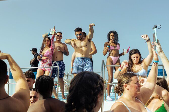Punta Cana Party Boat and Open Bar (Adults only) - Extras that can add up: photos, premium drinks, and how to manage the onboard pressure