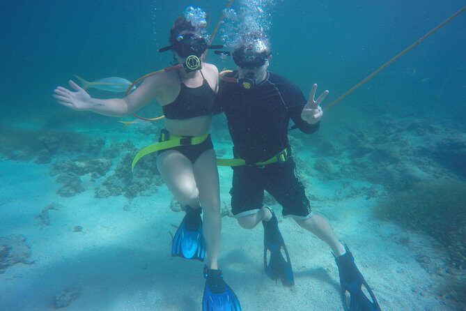 Punta Cana Party Cruise with Snorkeling, Hooka Diving and Parasailing - Getting on the Catamaran: Pickup, Mobile Ticket, and Los Corales Start