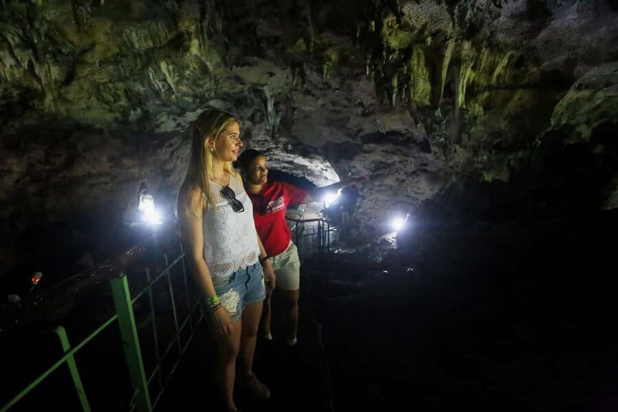Santo Domingo: Three Eyes National Park Guided Tour - The raft-style ride and the emerald cenote experience