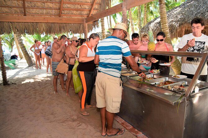 Saona Island Day Trip with Lunch, Transportation and Drinks - Catamaran cruising toward Saona: fun energy, practical timing