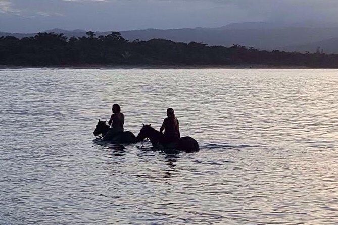 Sunset Beach Horseback Riding - Getting picked up and kitted with a helmet