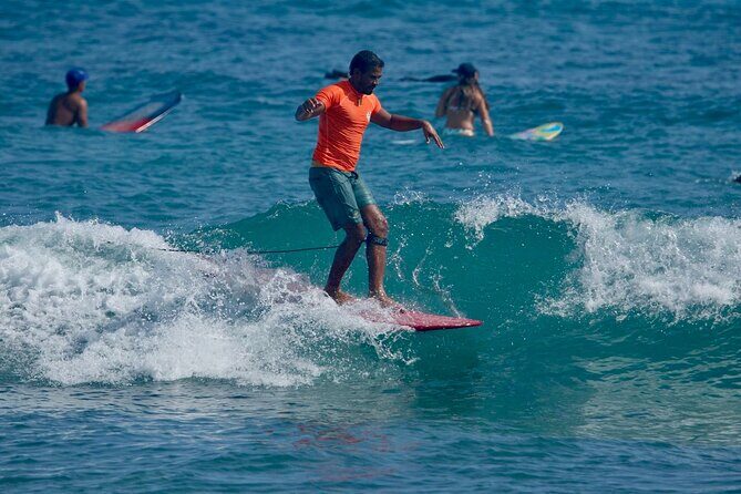 Surfing lesson at beautiful beach Playa Encuentro - Price and what $75 buys you in a 90-minute lesson