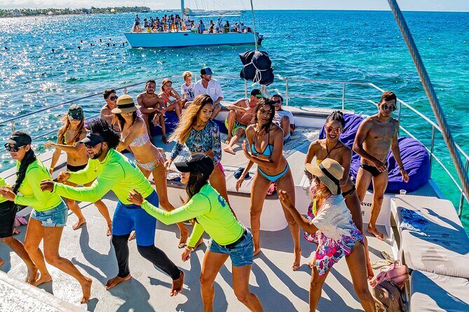 Up to 15 passengers Private Catamaran Sailing from Punta Cana - Step one: snorkeling at Power Adventures, with a guide doing the heavy lifting